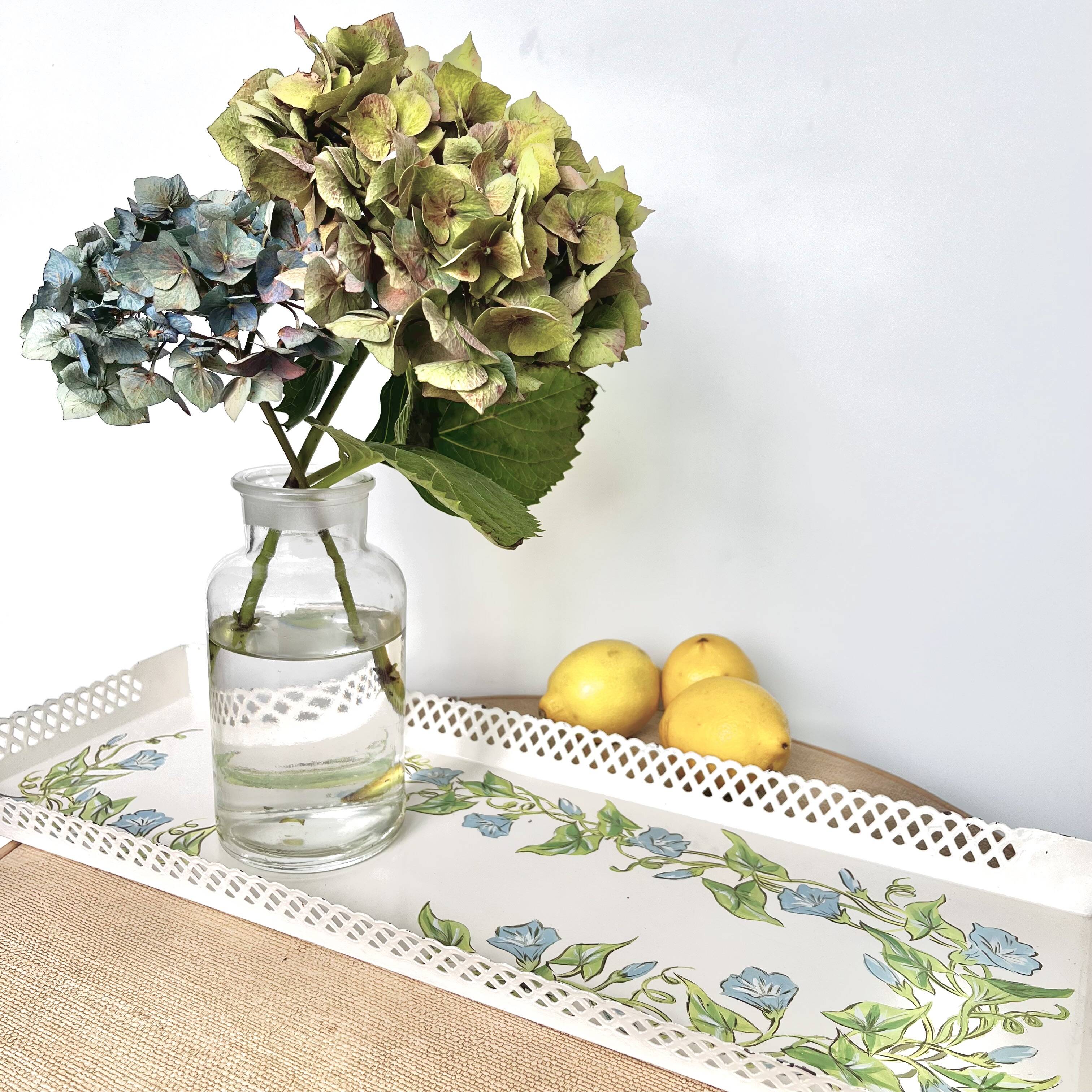 Large painted sheet metal tray with flower decoration