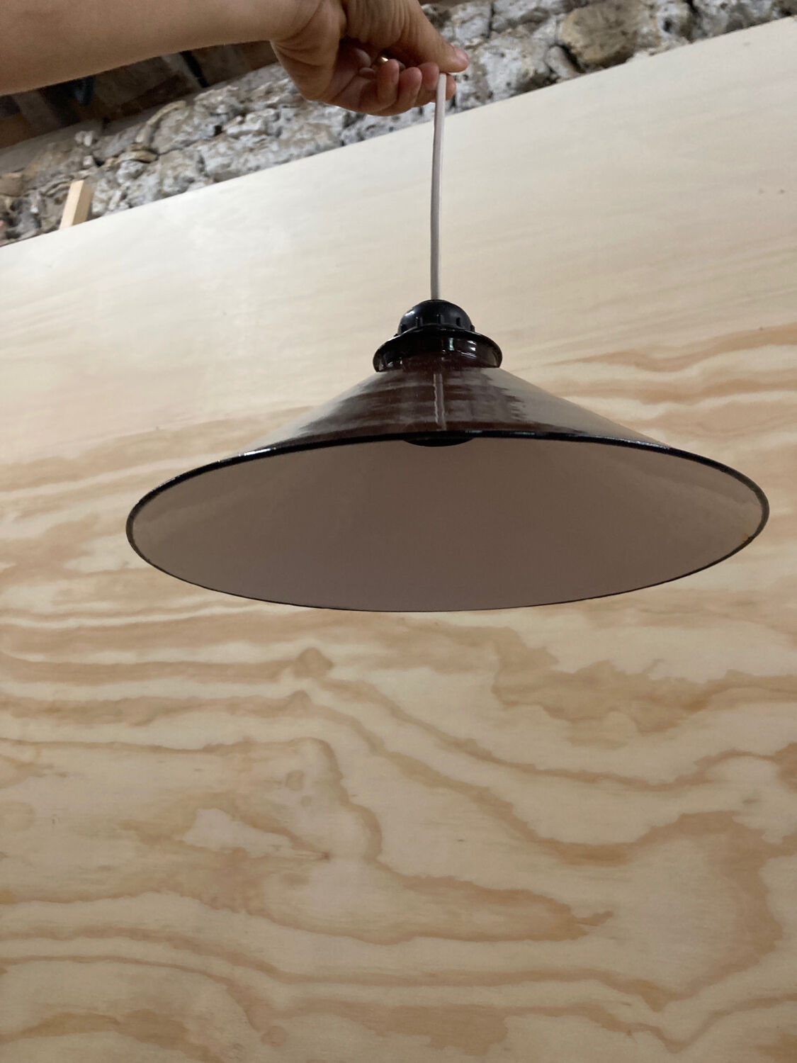 Industrial pendant light in brown and white enameled sheet metal