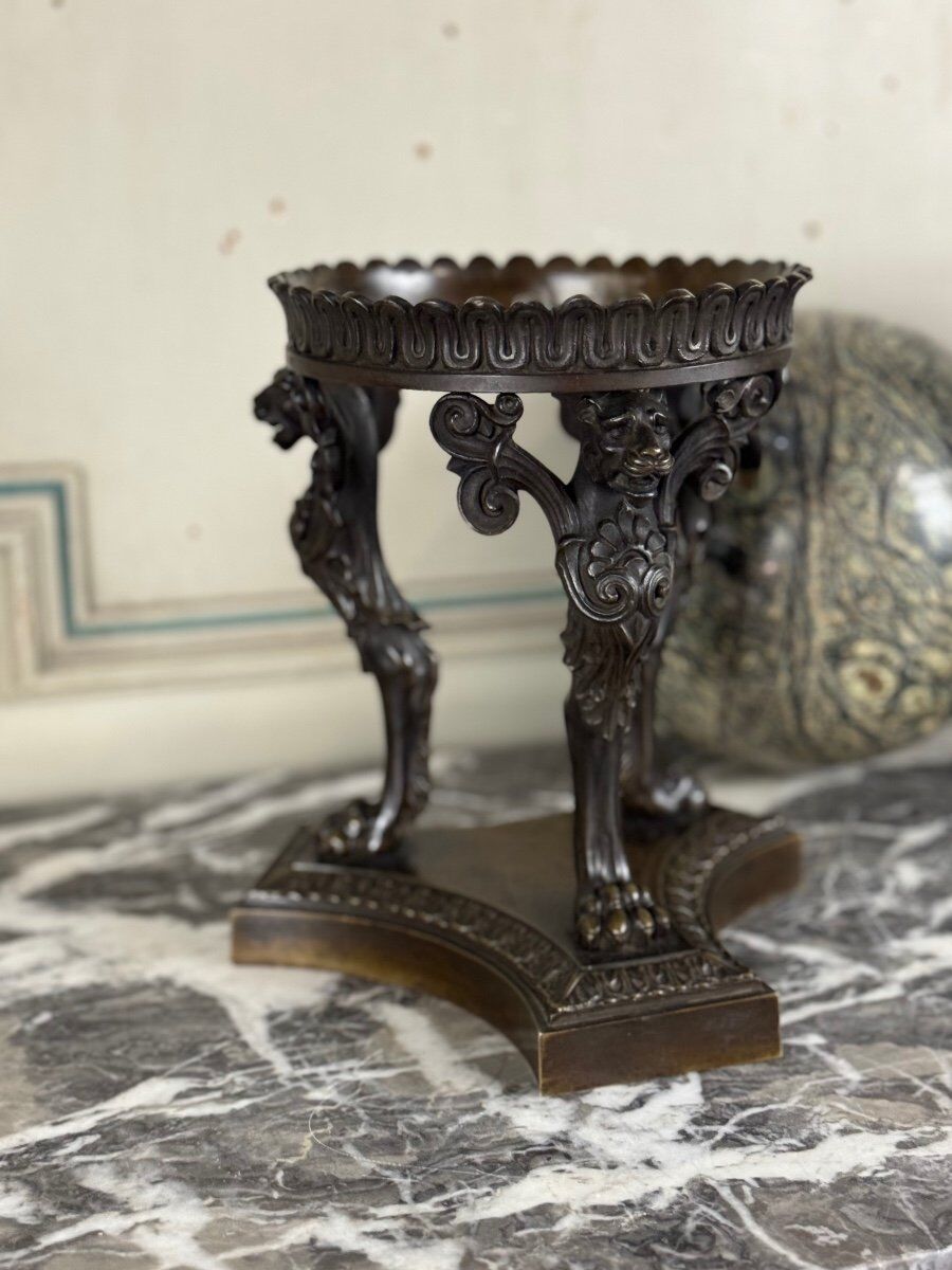 Pair of marble spheres on bronze tripods, 19th century