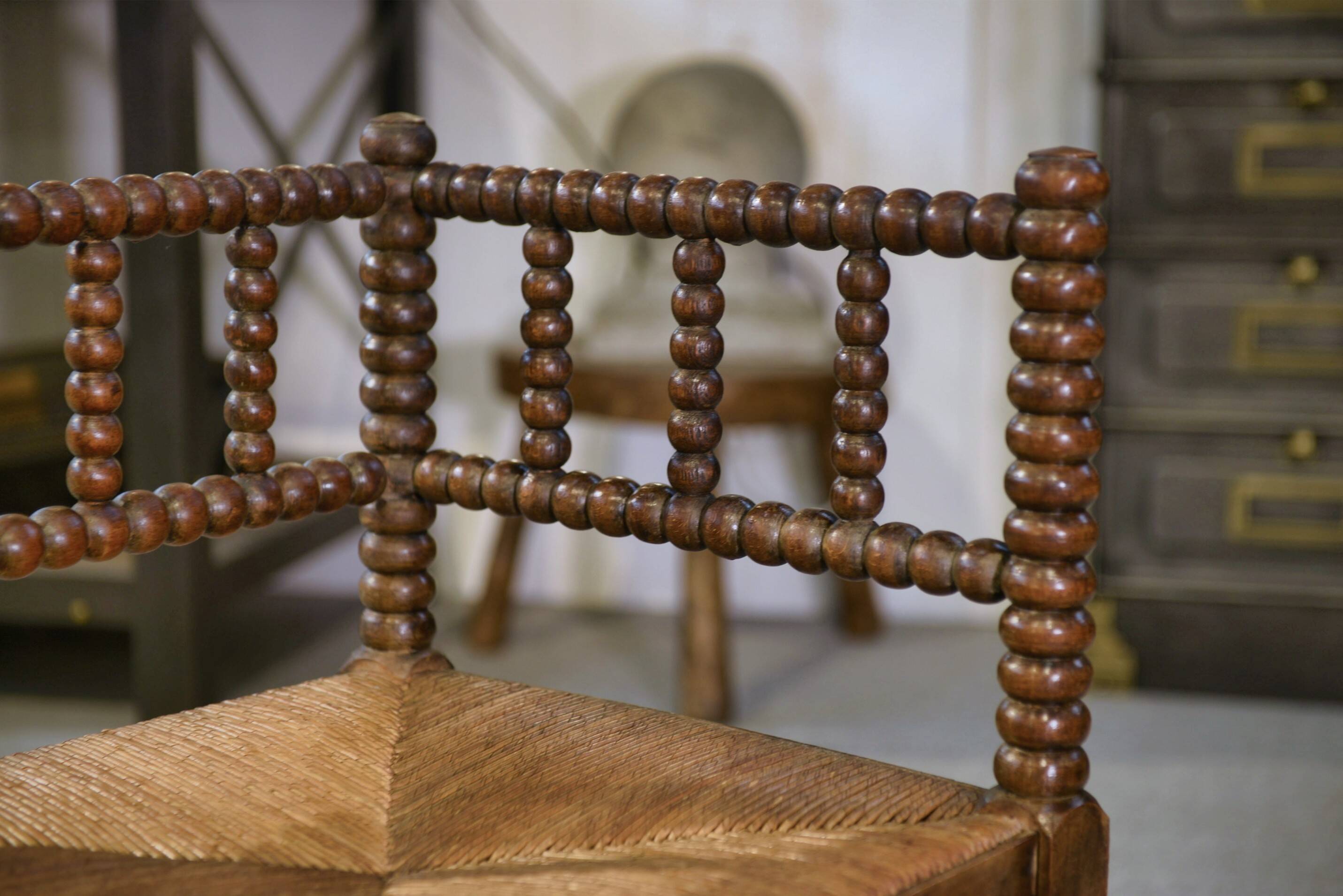 Pair of turned wooden corner chairs from the 1950s.