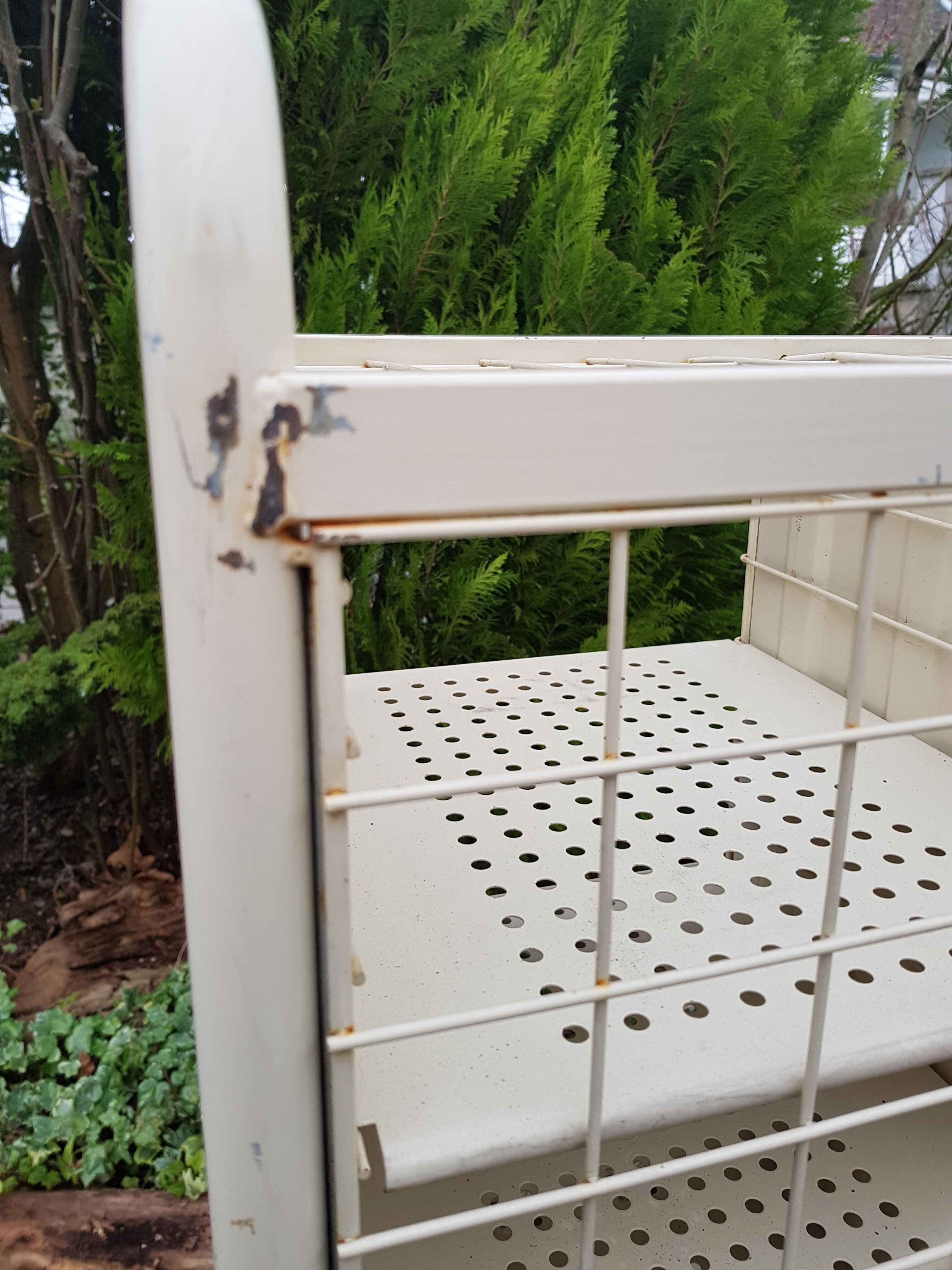 Metal shelf the Post