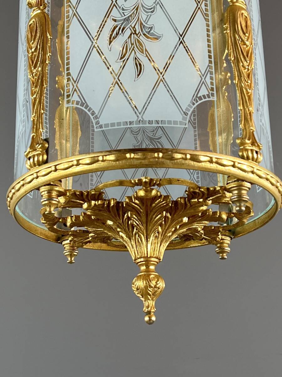 Louis XVI style lantern in gilded bronze and engraved glass, 20th century.