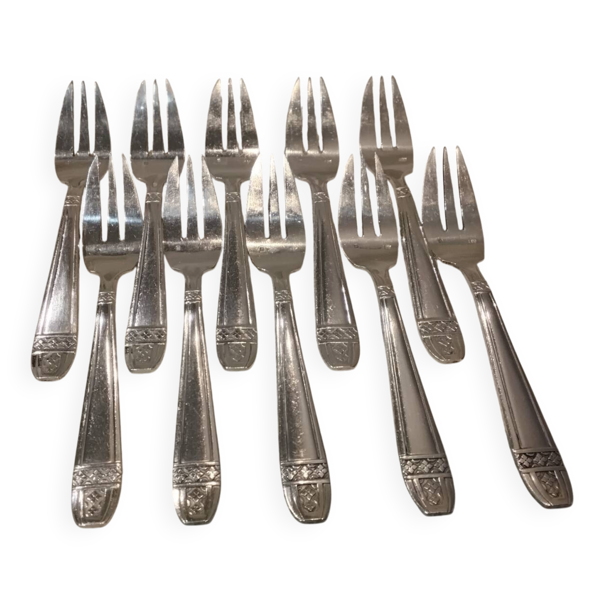 10 silver-plated metal cake forks from the Monaco Grand Prix