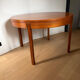 Extendable teak round table