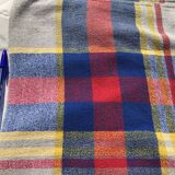 Light gray rectangle tablecloth with blue red yellow tiles
