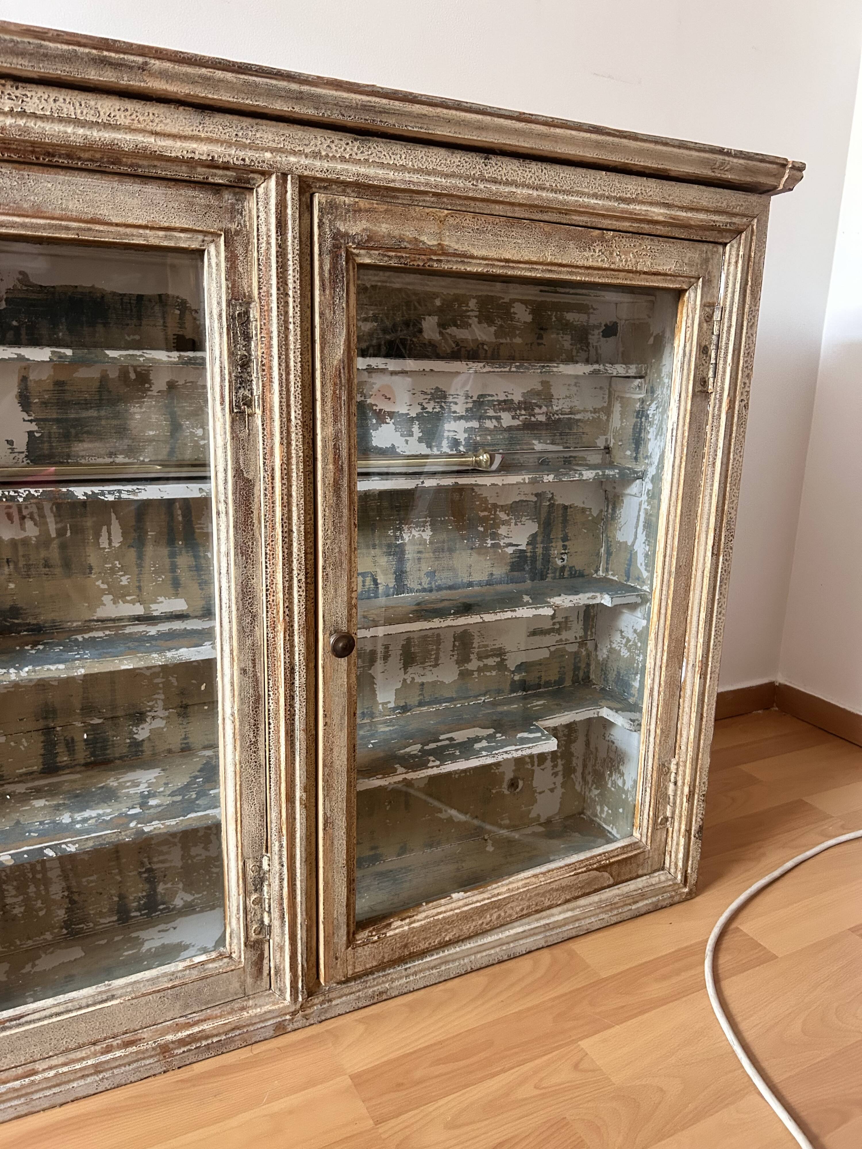 Old wooden shop display case to hang from the early 20th century.