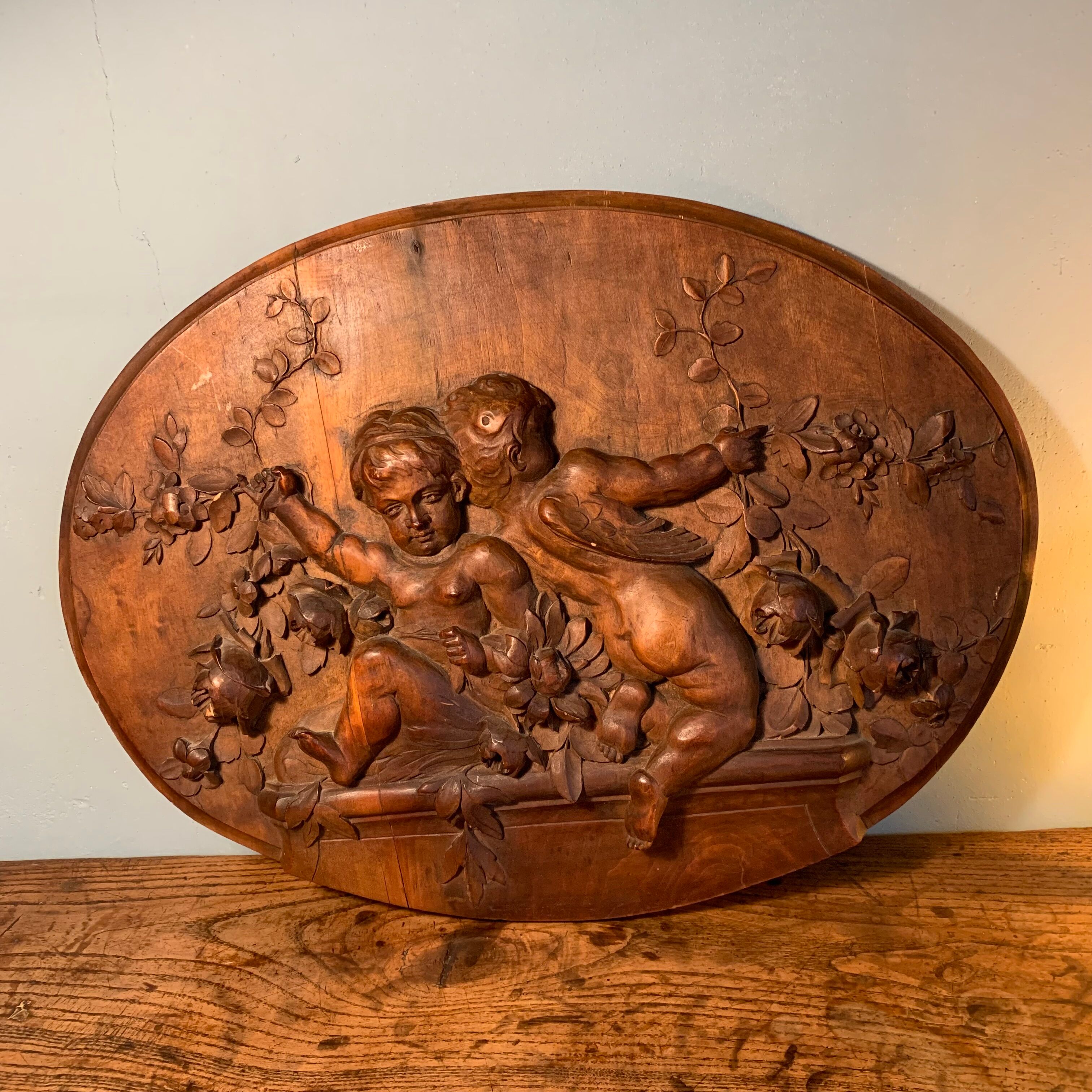 Carved wooden bas-relief