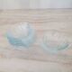 8 small shell-shaped ramekins in transparent glass
