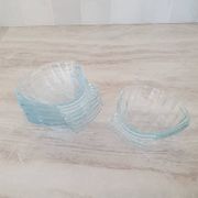 8 small shell-shaped ramekins in transparent glass