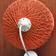Hanging lamp in braided orange threads 50
