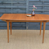 Single extension dining table by McIntosh