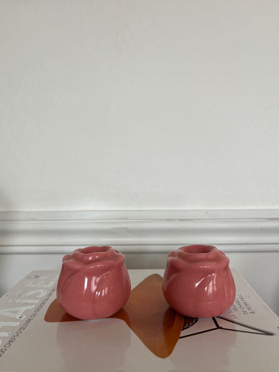 Pair of pink ceramic candle holders