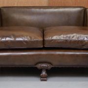 Restored Regency canapé in leather with sculpted Hermès frame.