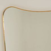 Patinated brass-framed mirror. 1980s/90s.