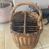 Wicker and hazel bottle basket from the early 20th century or possibly earlier.