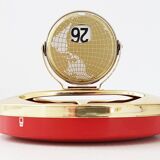 Vintage 1950s brass gold-plated globe perpetual calendar ashtray.