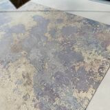 Coffee table with chrome base and mirrored glass top, vintage solar flare decor