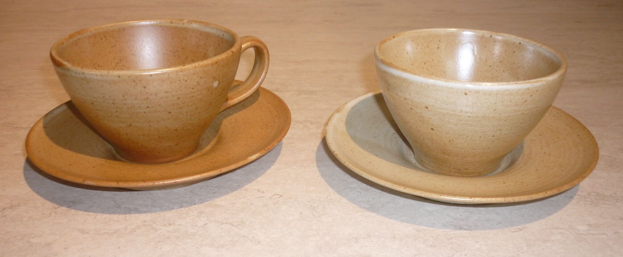 CNP Village stoneware cups and sub-cups