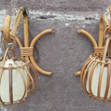 Pair of Louis Sognot rattan wall lights.