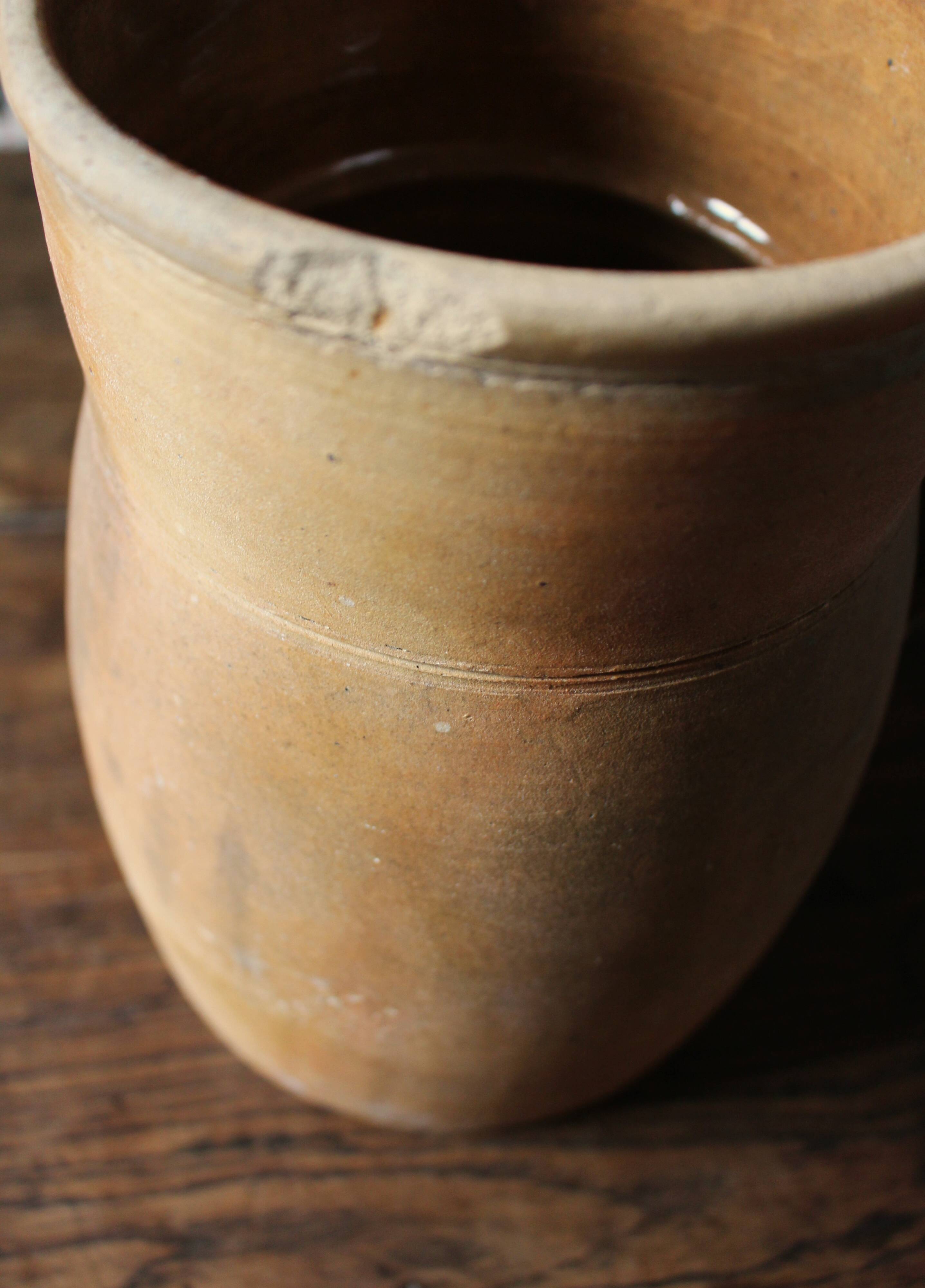 Vintage artisanal terracotta jug