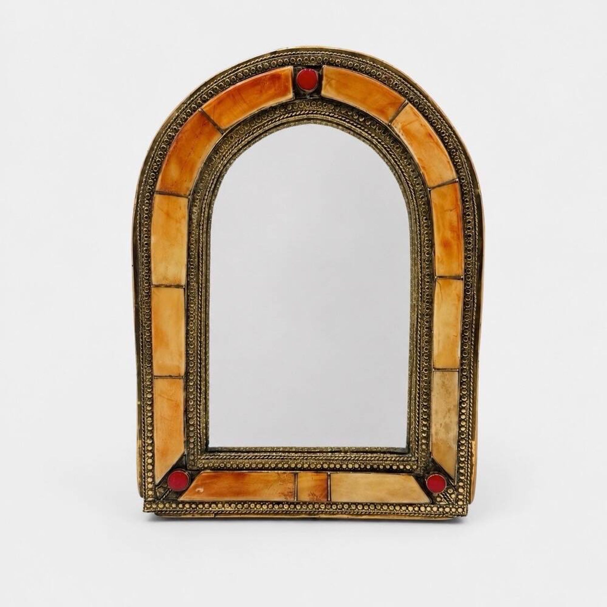 Moroccan brass mirror from the 1980s.