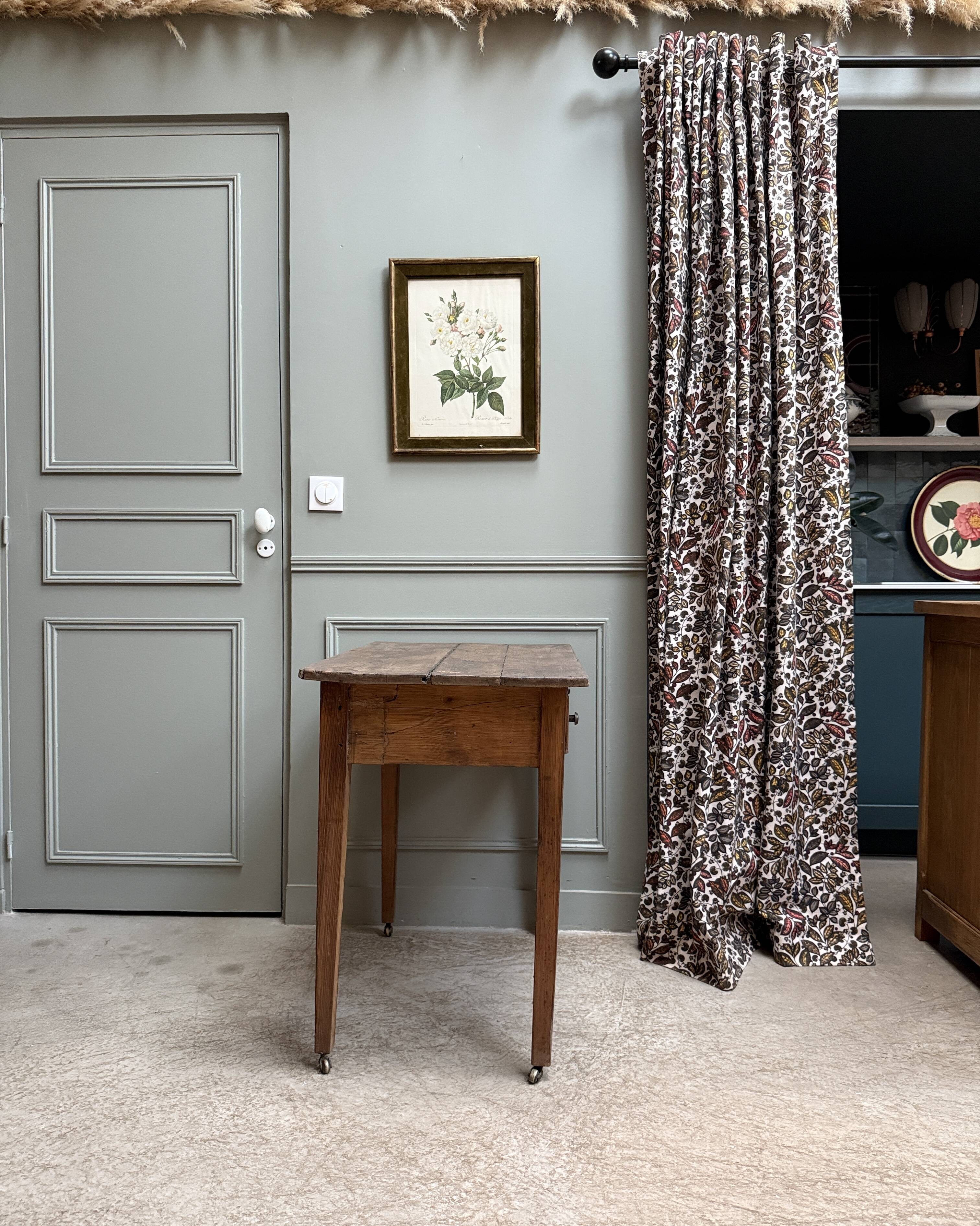Small antique desk on wheels