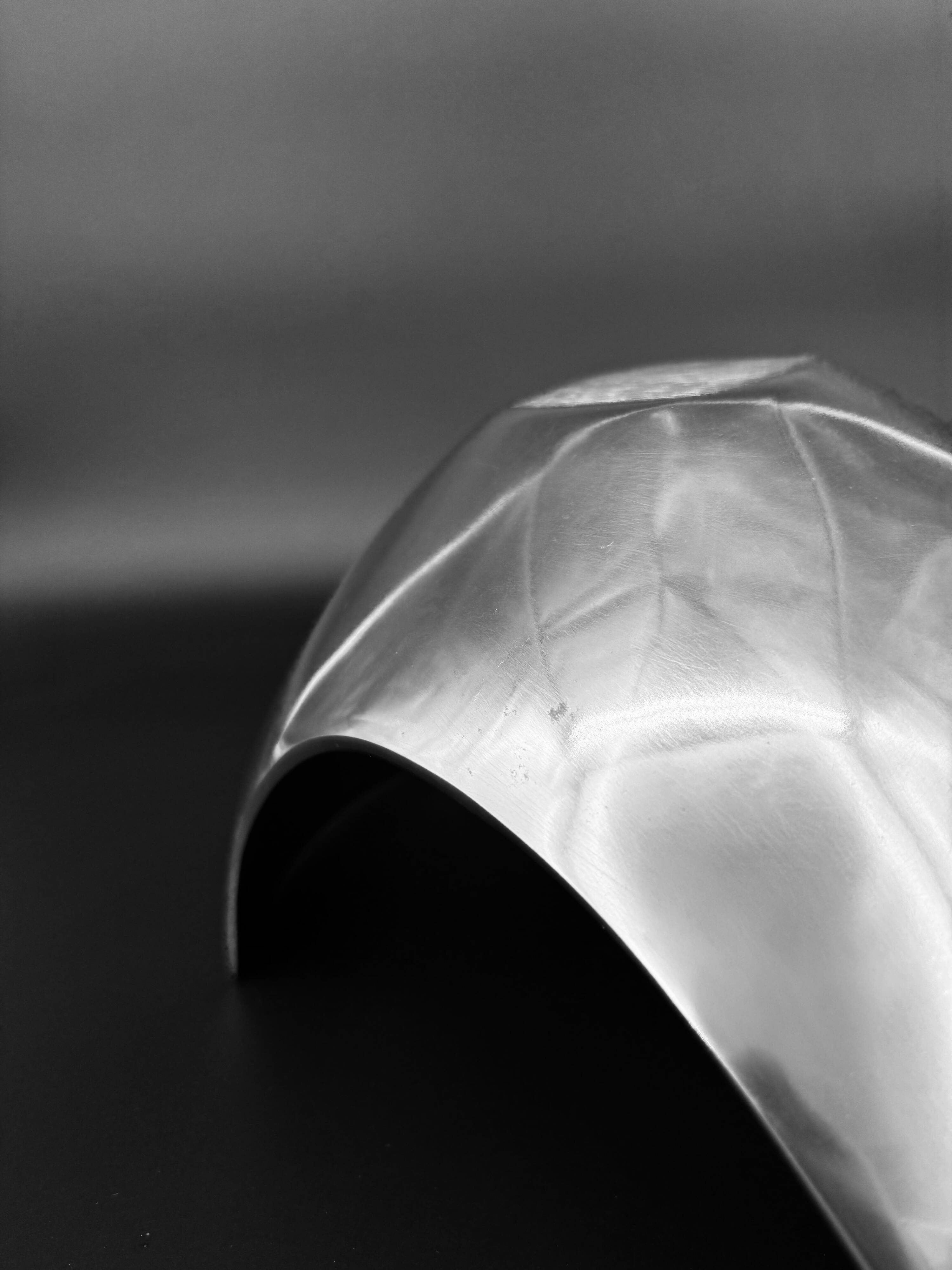 Sculptural polished aluminium bowl, in the style of Michael Lax, 1970s.