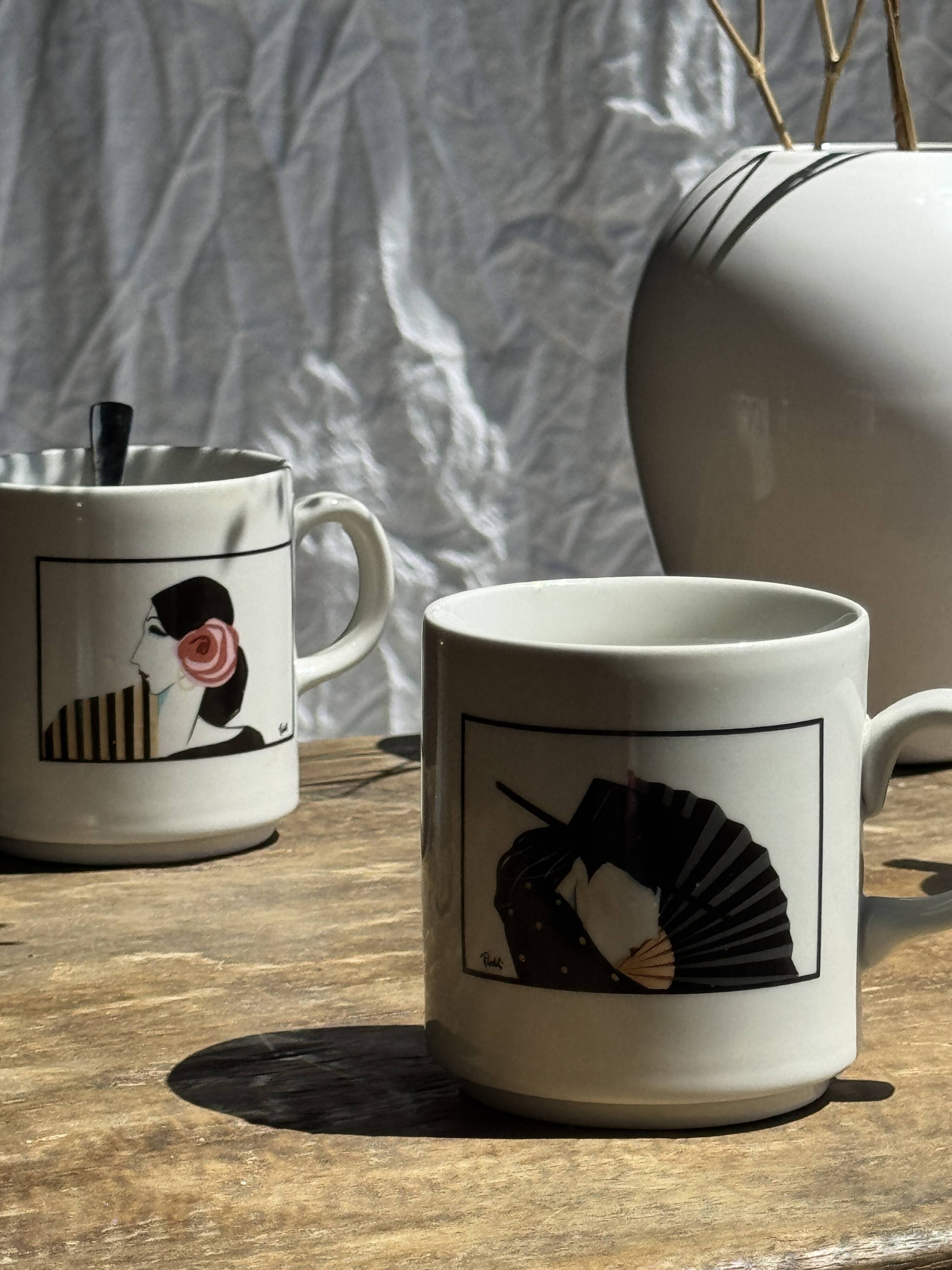 Pair of mugs with stylized Italian women motifs