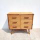 Commode en rotin vers 1960