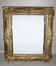 Miroir en bois et stuc redoré de style rocaille 33x29
