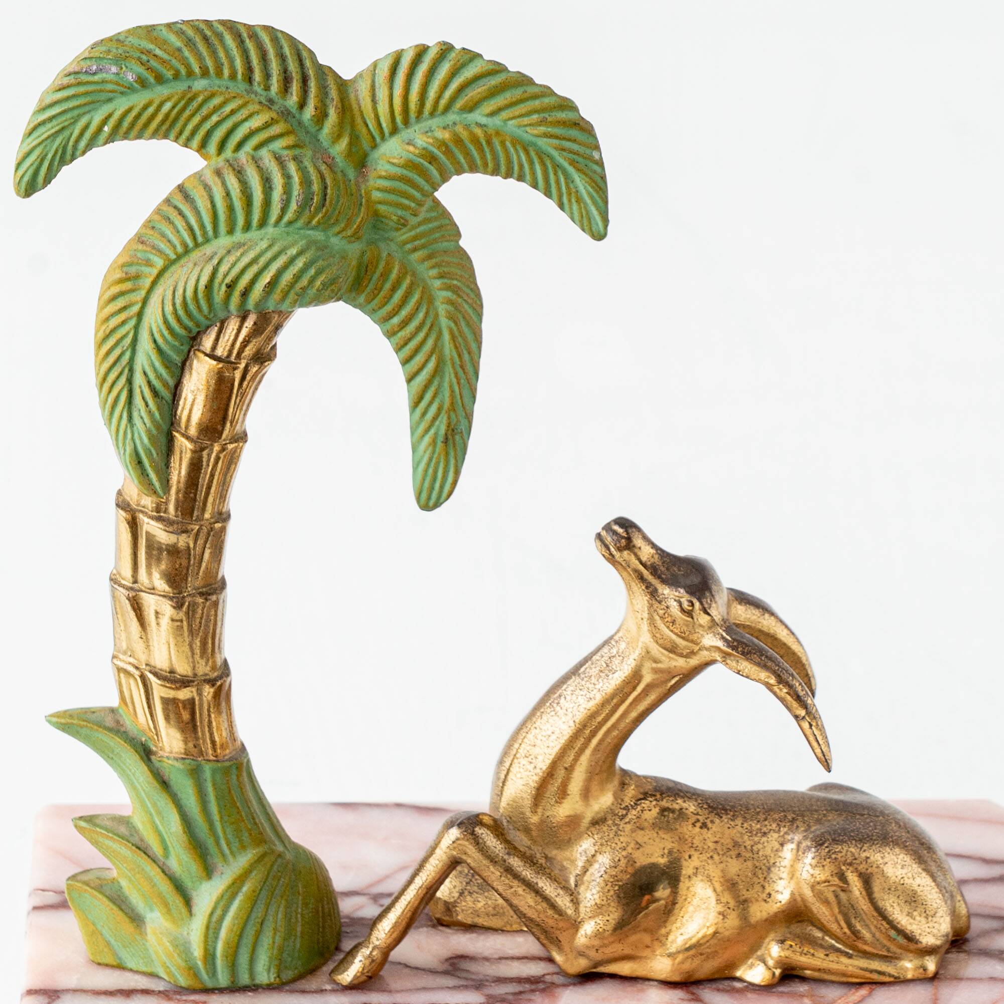Pair of Art Deco Bookends in Pink Breccia Marble with Antelope and Palm Tree