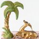 Pair of Art Deco Bookends in Pink Breccia Marble with Antelope and Palm Tree