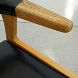 Danish armchair in oak and black leather