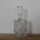 Antique cut glass carafe, probably crystal – Geometric patterns and matching stopper.