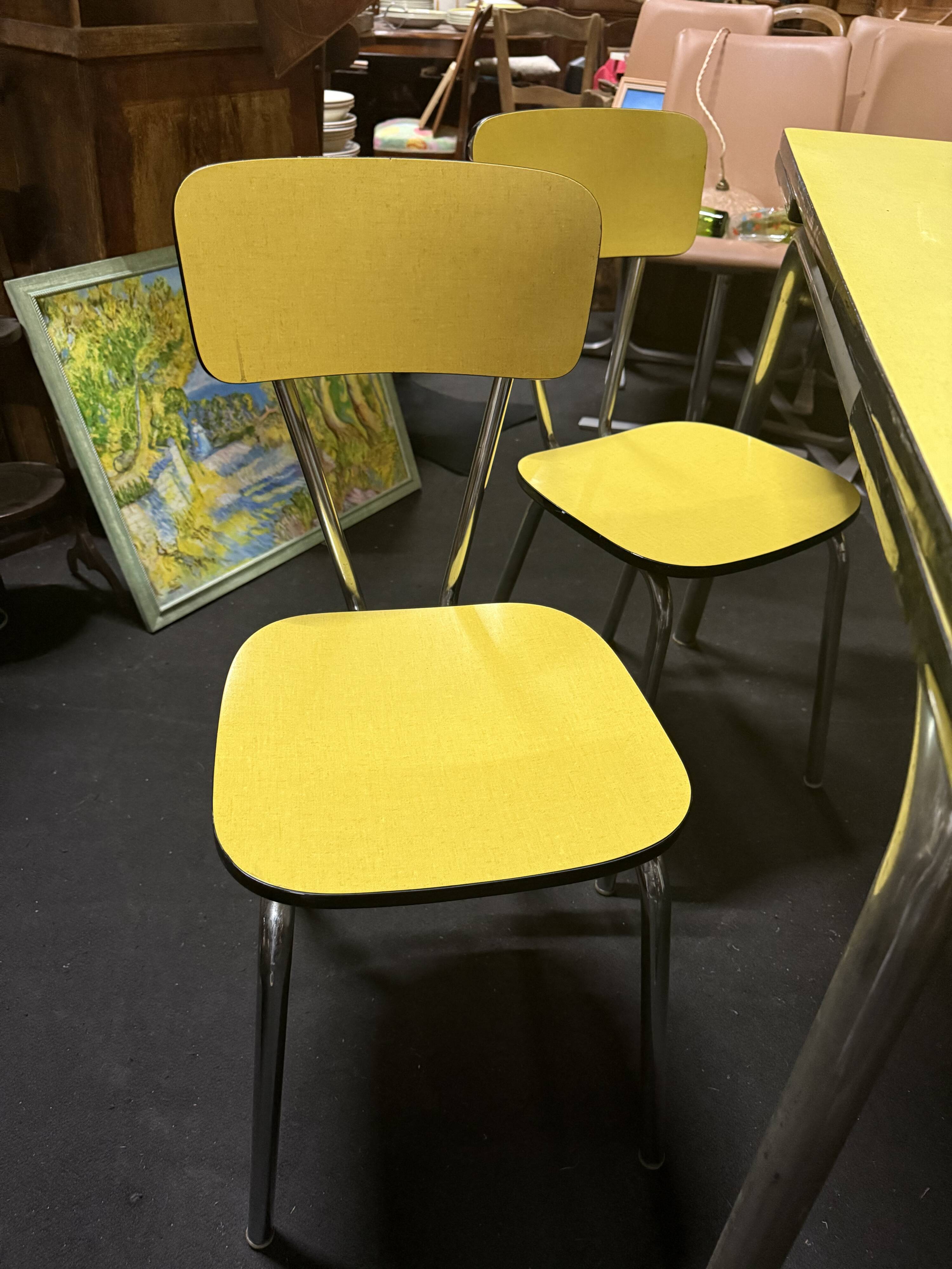 Table and 4 chairs in yellow formica