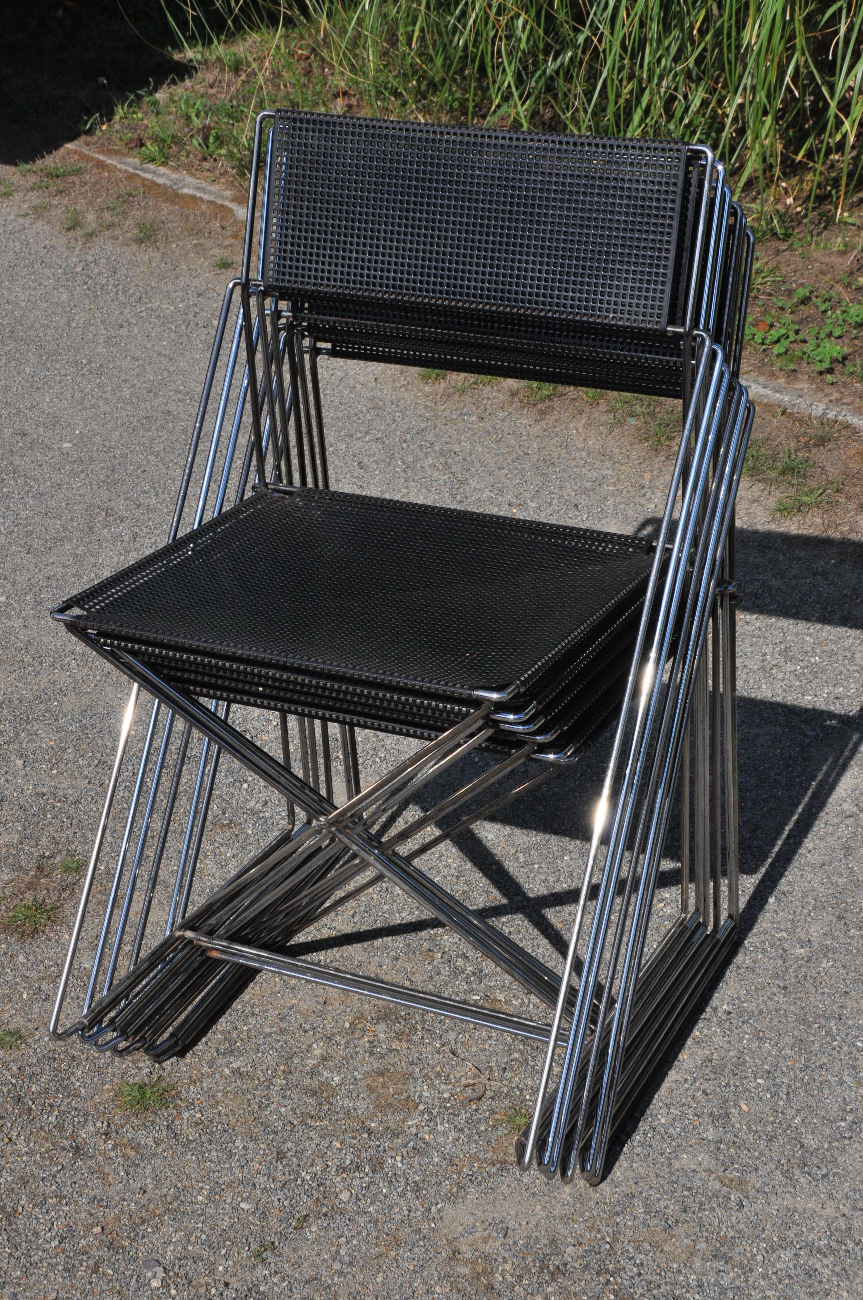 Nuova x line omli chairs by Niels Jørgen Haugesen