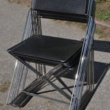 Nuova x line omli chairs by Niels Jørgen Haugesen