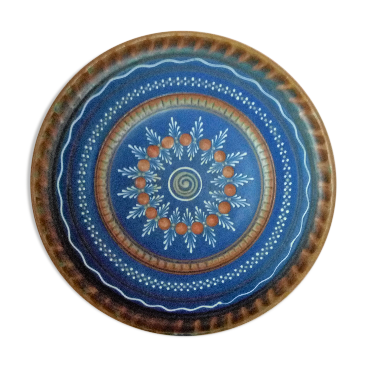 Plate in painted sandstone