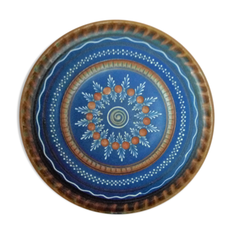 Plate in painted sandstone