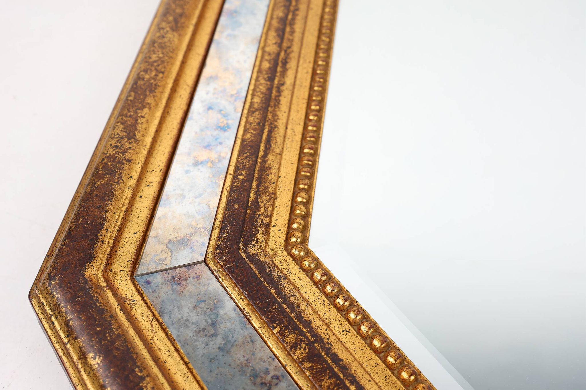 Gilded octagonal mirror by Deknudt Belgium decorated with smoked mirror gla