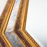 Gilded octagonal mirror by Deknudt Belgium decorated with smoked mirror gla