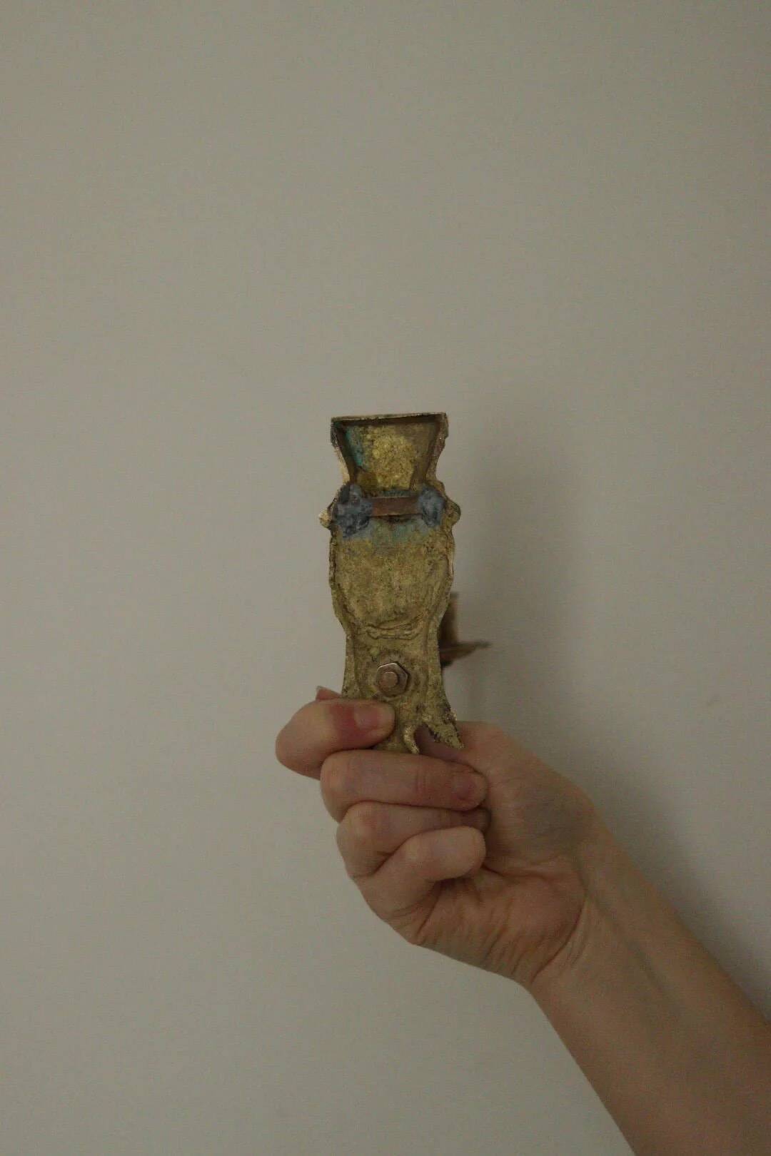 Pair of mid-century Swedish brass face motif sconces