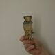 Pair of mid-century Swedish brass face motif sconces
