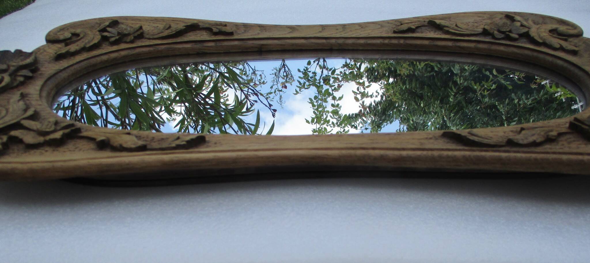 Antique carved wooden mirror