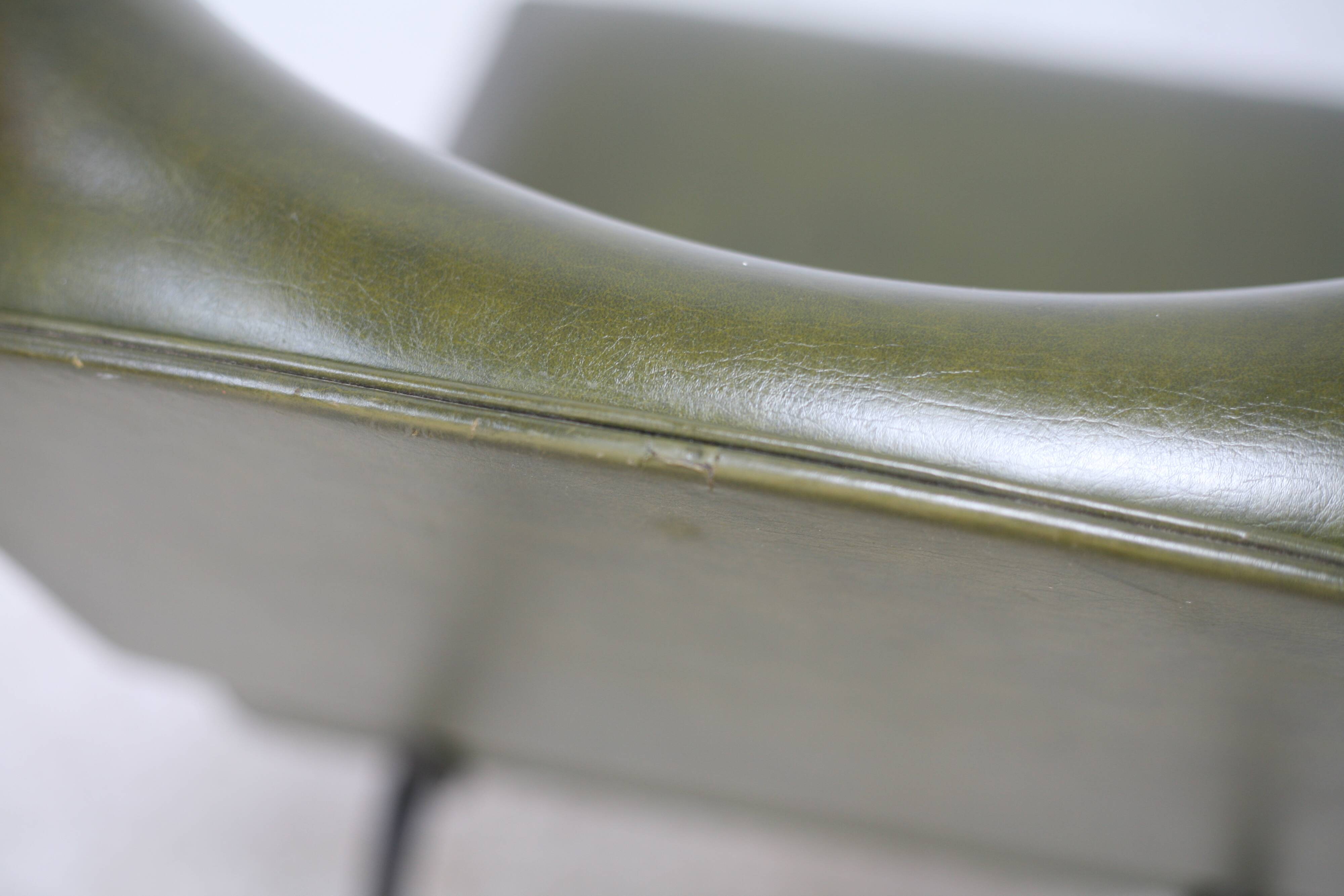 Pair of tubular armchairs, imitation leather. Circa 1950