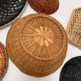 Wall composition of wicker baskets and trays.