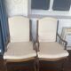 Pair of Louis XV style armchairs in walnut with rush seating.