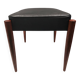 Footstool with teak wood legs and black skai (imitation leather) 1970s