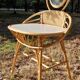 Vintage rattan hairdresser, 1960s, round mirror and woven backrest.