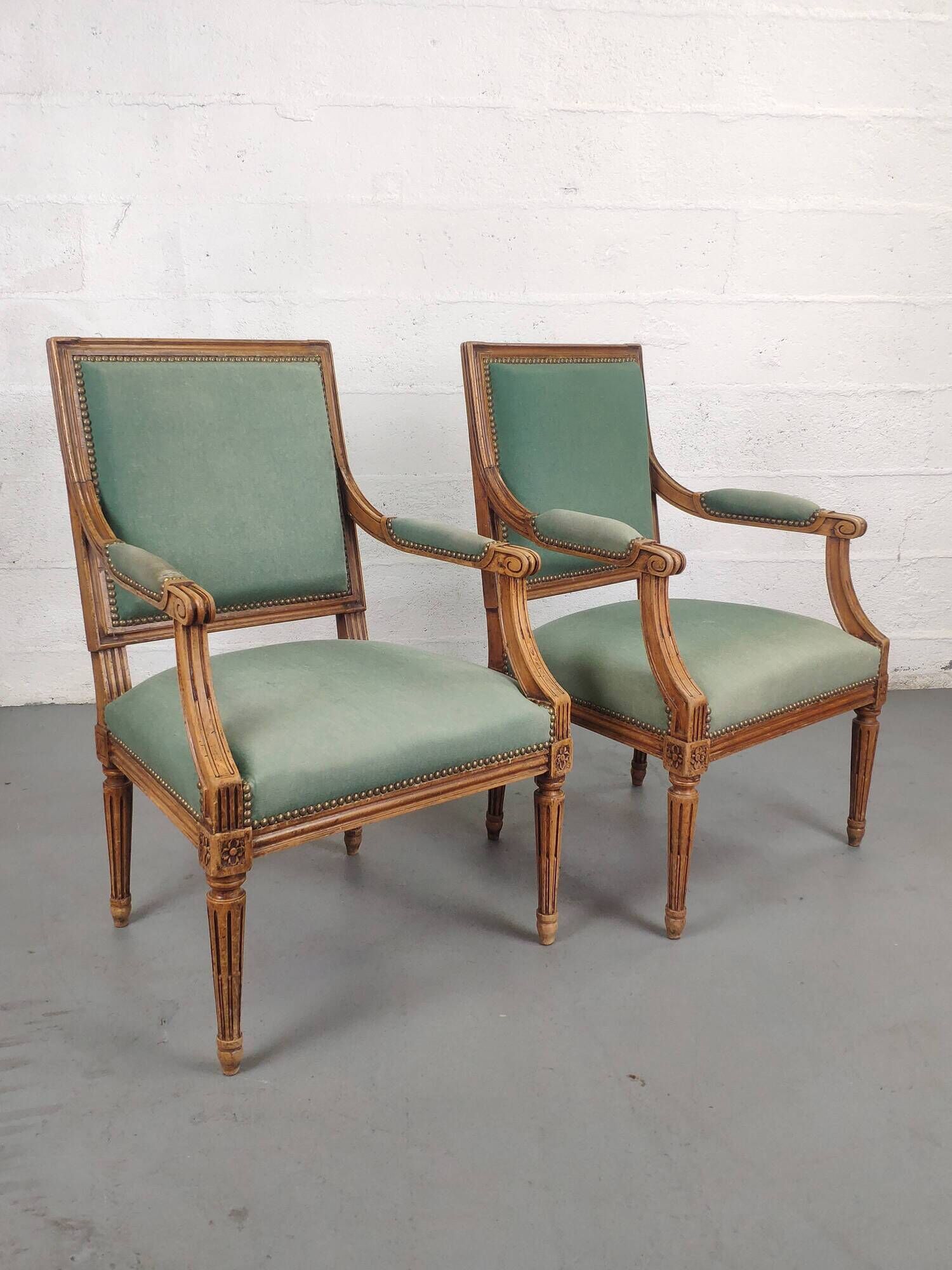 Pair of Louis XVI armchairs upholstered green velvet